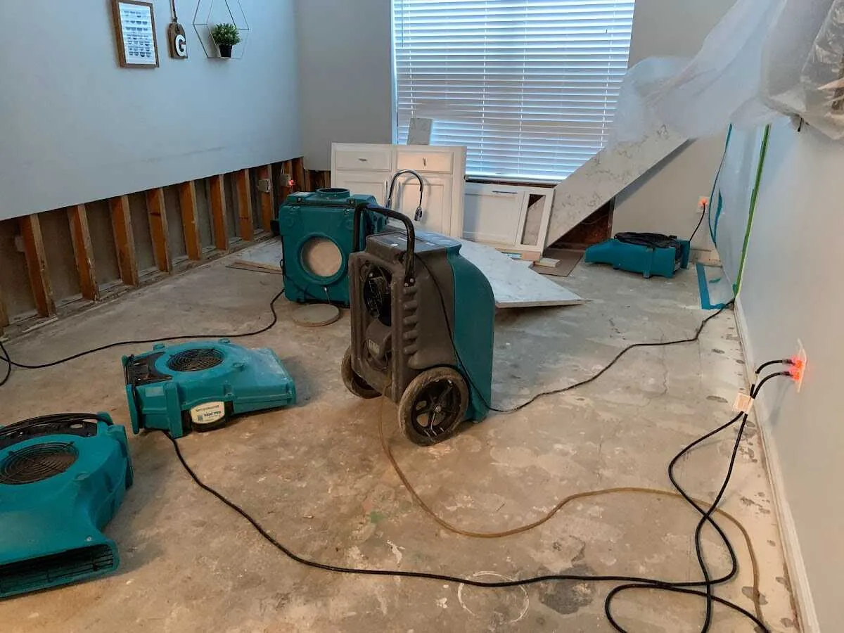 Dehumidifier in flood-cut room for Water Damage Restoration in Cherokee