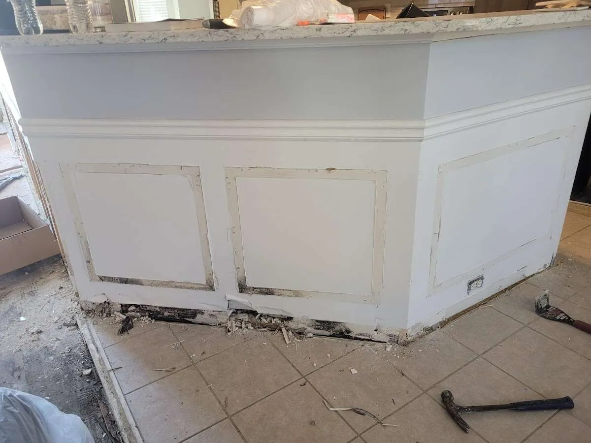 Water damage and mold on kitchen during Storm Damage Restoration in Cherokee